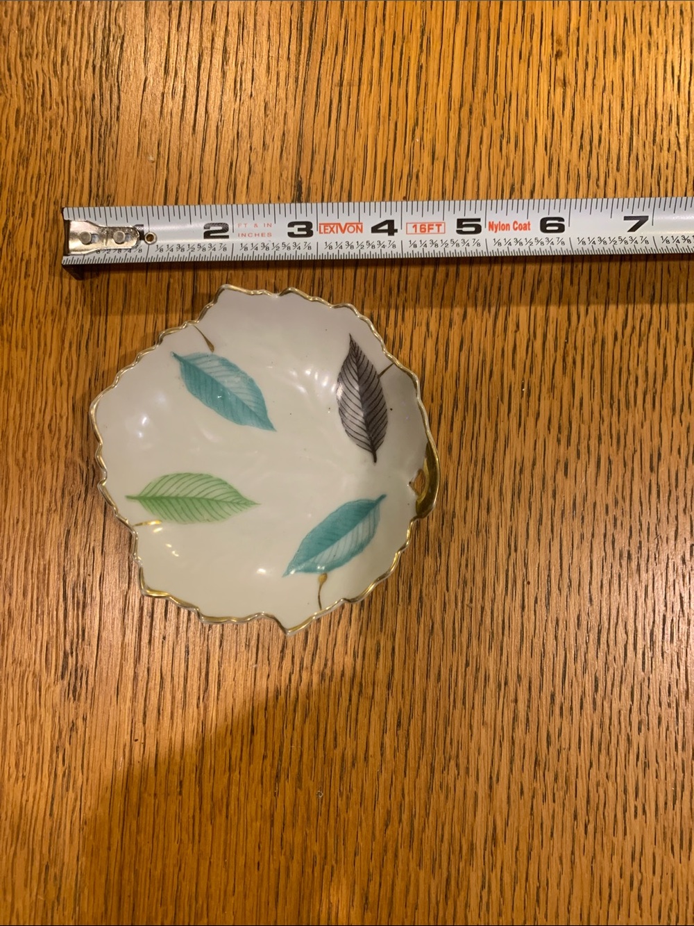 Porcelain Leaf Accent Trinket Dish in White and Teal-Green with Gold Rim